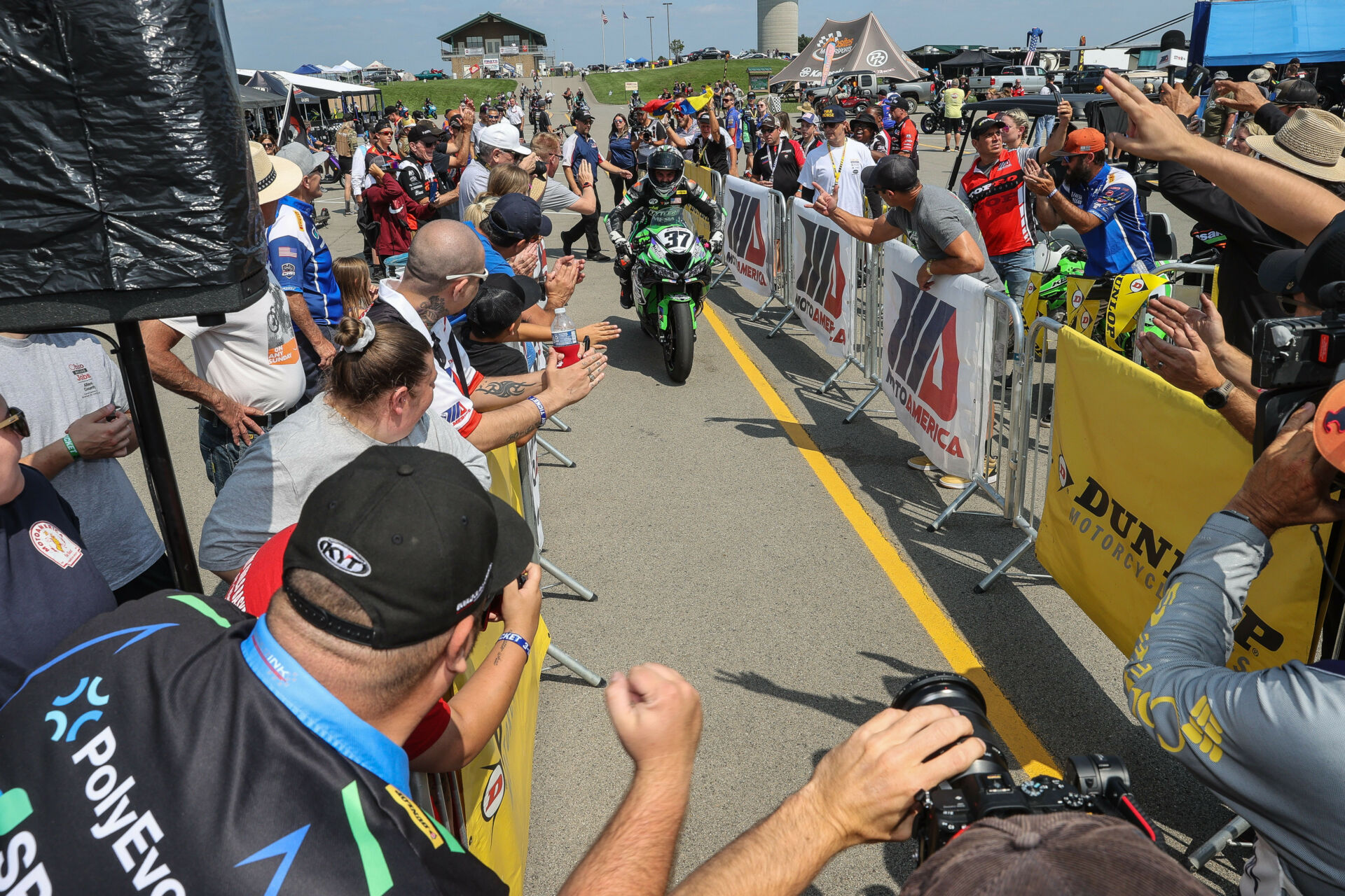 Stefano Mesa (37) rolls into the podium area after winning MotoAmerica Supersport Race One at PittRace in 2023. Photo by Brian J. Nelson.